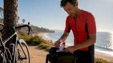Cyclist preparing nutrition supplies for long ride
